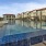 a swimming pool surrounded by buildings