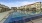 a swimming pool surrounded by buildings