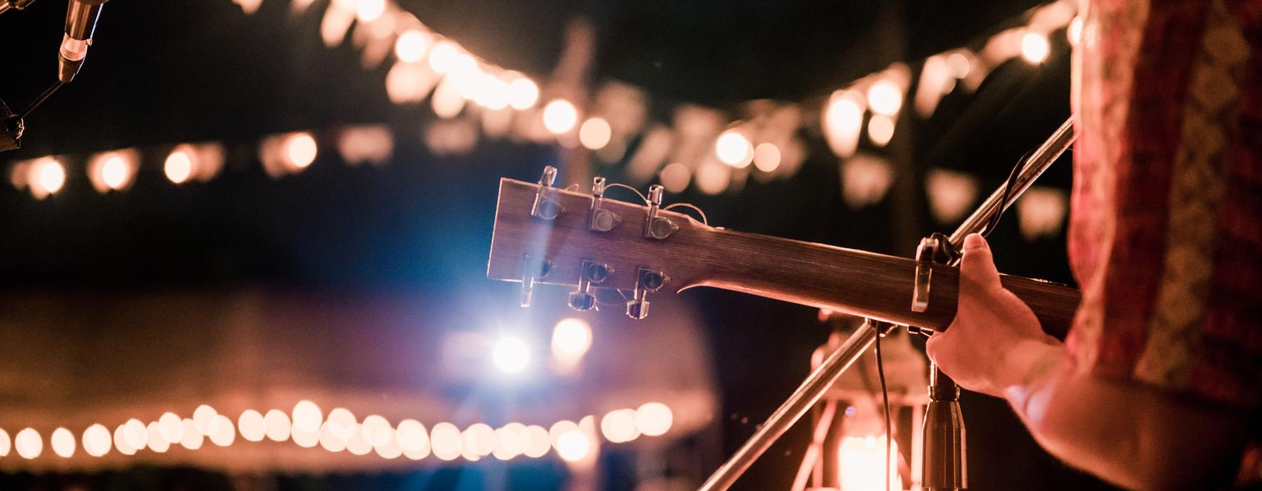 a person playing guitar