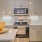 a kitchen with white cabinets
