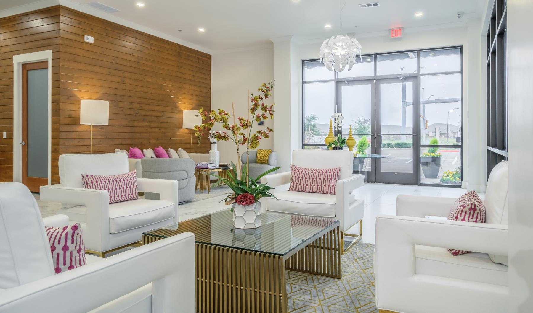 The essence of exceptional living a living room with white couches and a glass table