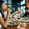 a group of people eating at a restaurant