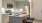 a kitchen with white cabinets